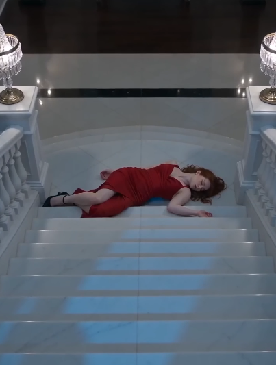 She shoved her rival down the stairs, but the camera caught every single move.